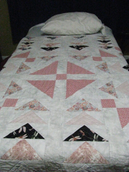 Pink and gray quilt with gray backing, 66" by 66"